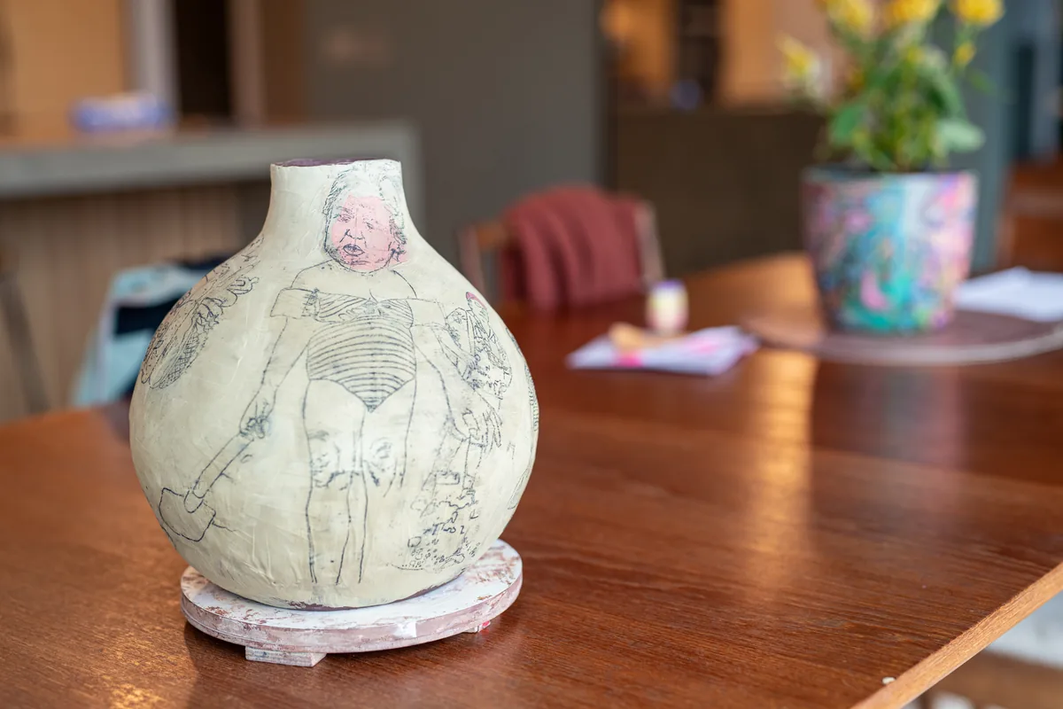 A hand-built vessel on the artist's table